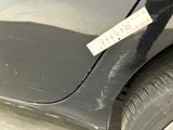 a sticker on the side of a car with a sticker attached to it