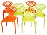 several chairs are lined up in a row on a white surface