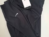 a pair of black nike leggings with a tag on them