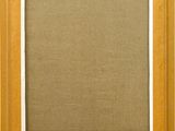 an empty picture frame with a brown background and a white border