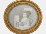 portrait d'une femme et d'un enfant dans un cadre doré