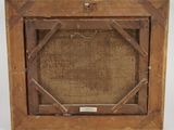 an old wooden picture frame with a picture inside of it