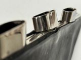 a close up picture of a metal flask with two metal pipes
