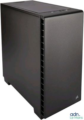 a black computer case sitting on top of a white surface