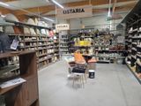 a grocery store with a lot of items on the shelves