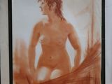 a picture of a painting of a nude woman on the wall