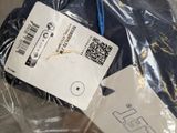 a plastic bag with a label on it and a pair of scissors in it
