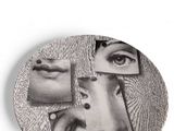 a picture of a plate with a picture of a woman ' s face on it
