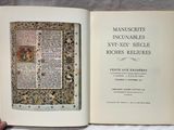 someone is holding a book open to a page with a picture of a man