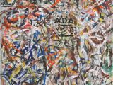 une peinture abstraite recouverte d'une abondance de peinture colorée
