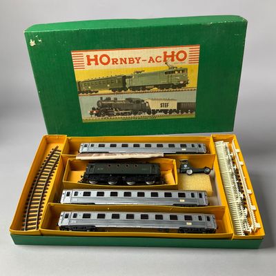 a box with a train set in it on a table