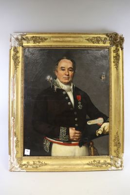 portrait of a man in a military uniform holding a book
