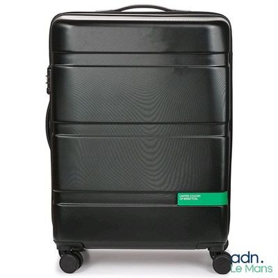 a black suitcase with a green label on it