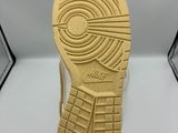 the sole of a person ' s shoe with a yellow sole