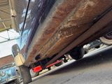 a close up view of a car under a vehicle