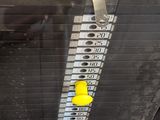 a yellow sticker on the side of a machine
