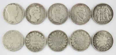 six different types of silver coins on a white surface