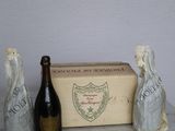three bottles of wine sitting next to each other on a table