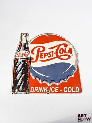a pepsi cola sign with a bottle on top of it