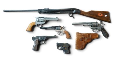 many different types of guns on a white background
