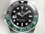 rolex watch with a black dial and green bezel