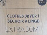 a box of clothes that is sitting on the floor