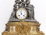 a clock that is sitting on top of a table