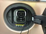 a close up of a car ' s plugged in to a vehicle