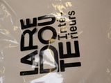 a picture of a plastic bag with a pair of scissors in it