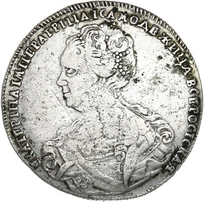 une pièce d'argent représentant une femme