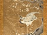 une photo d'une photo d'un oiseau sur un arbre