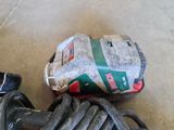a picture of a pair of shoes and a corded corded drill