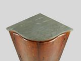 a small table with a marble top on it