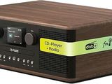 an image of a wooden radio sitting on top of a table