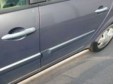 a car that is parked on the side of the street