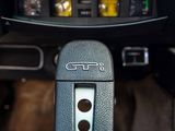 a close up of a steering wheel in a car