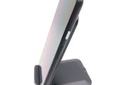 a cell phone that is sitting on top of a stand