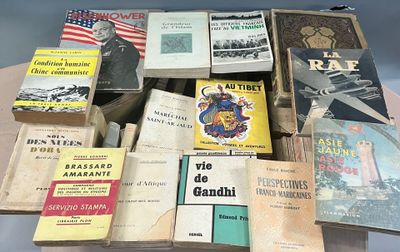 a lot of books that are sitting on a table