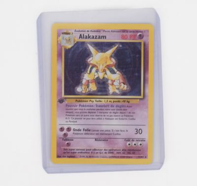 a close up of a pokemon card on a white surface