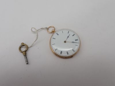 a pocket watch with a key attached to it
