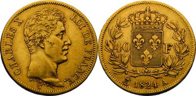 une pièce souveraine en or surmontée d'une couronne