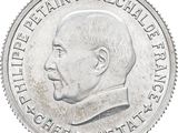une image représentant une pièce d'argent sur laquelle figure le portrait d'un homme