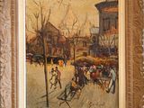 un tableau représentant une calèche sur une table