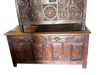 an old wooden chest with carvings on it