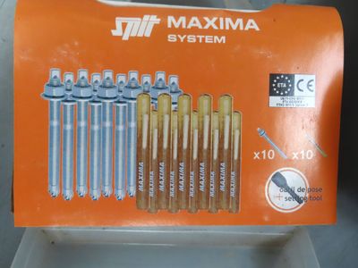 a box of screws that are sitting on a table