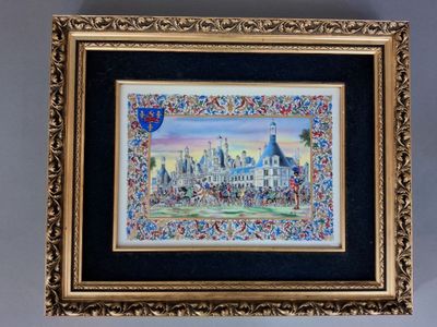painting of a castle in a gold frame on a wall