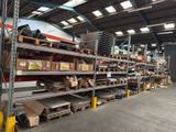 shelves in a warehouse filled with lots of boxes and boxes