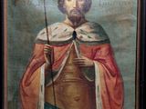 an old painting of a man with a beard and a red cape