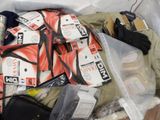 a bag full of clothes and other items that are in it