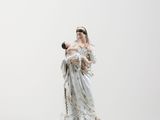 figurine of a woman holding a baby in her arms